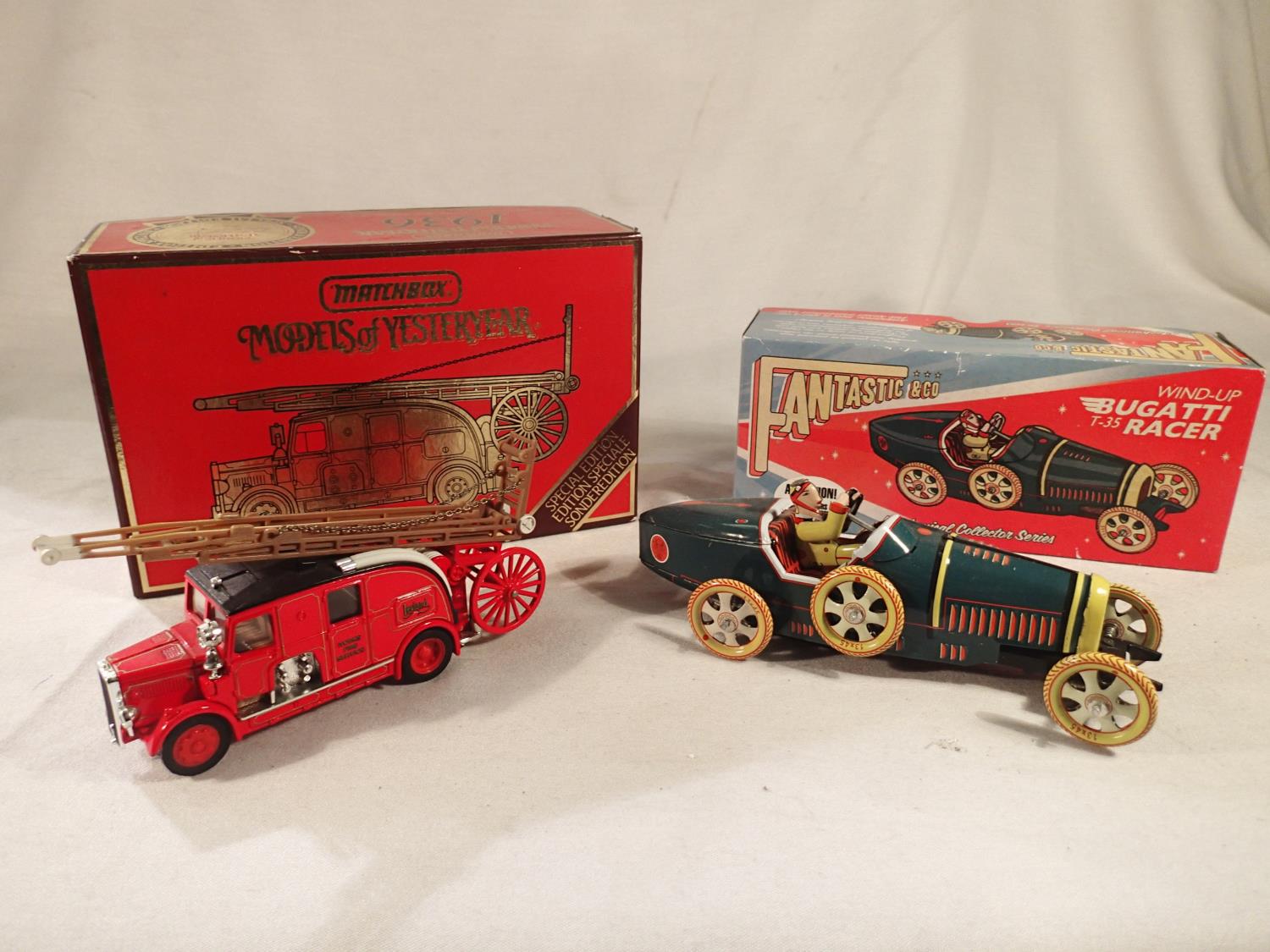 Matchbox YS9 Leyland cub fire engine, plus tinplate/clockwork Bugatti racer, both excellent