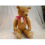 Vintage straw filled teddy bear, H: 60 cm, joined head, legs and arms, growler not working, loose