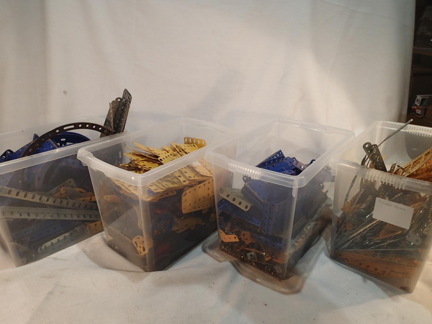 Selection of used blue/yellow/silver Meccano parts, plus a selection of build sheets. Not