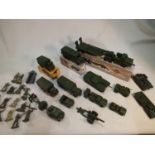 Twelve Dinky Toys military related vehicles, three boxed, plus Lone Star and Benbros, also