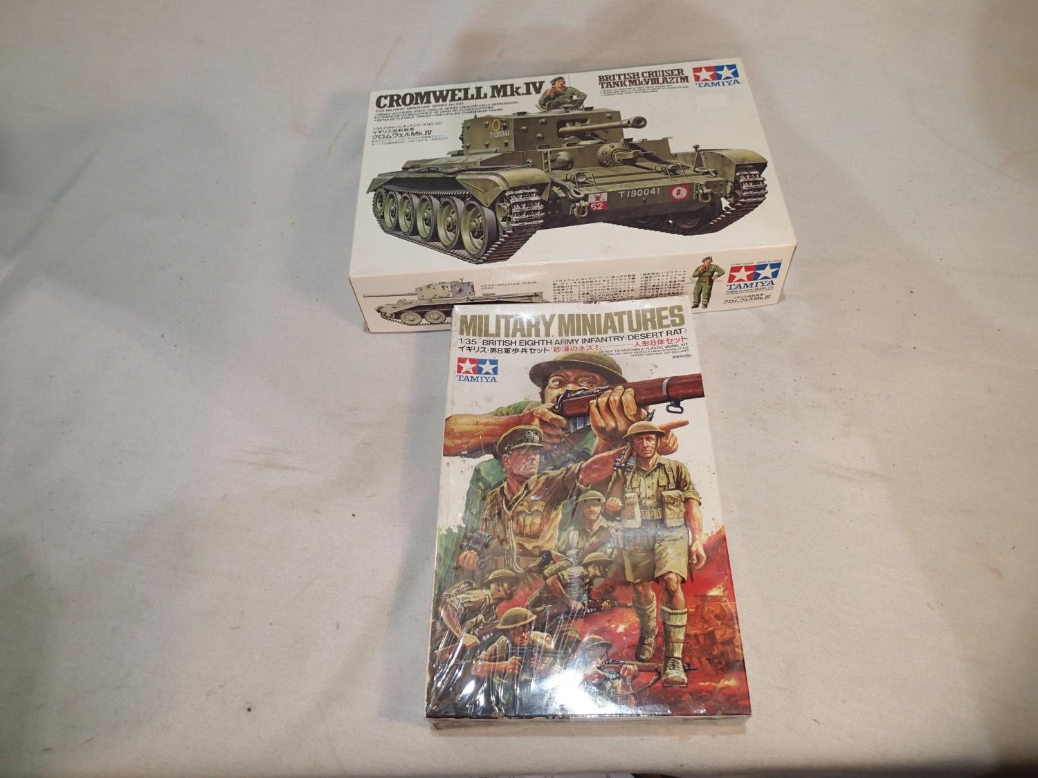 Two 1/35 scale military related Tamiya kits, Cromwell Ink IV tank and Desert Rats soldiers, appear