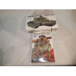 Two 1/35 scale military related Tamiya kits, Cromwell Ink IV tank and Desert Rats soldiers, appear