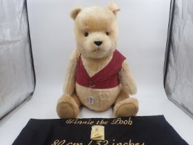 Steiff Bears, Winnie the Pooh, with tag unattached with tearing, pin in ear with white label/red