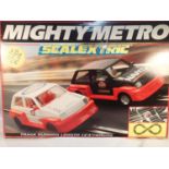 Scalextric Mighty Metro set, appears complete, excellent condition, with decal sheet, box with wear.