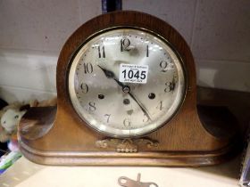 Junghans Wurtt Emberg mantle clock with Westminster chime, glass cracked, #153. Not available for