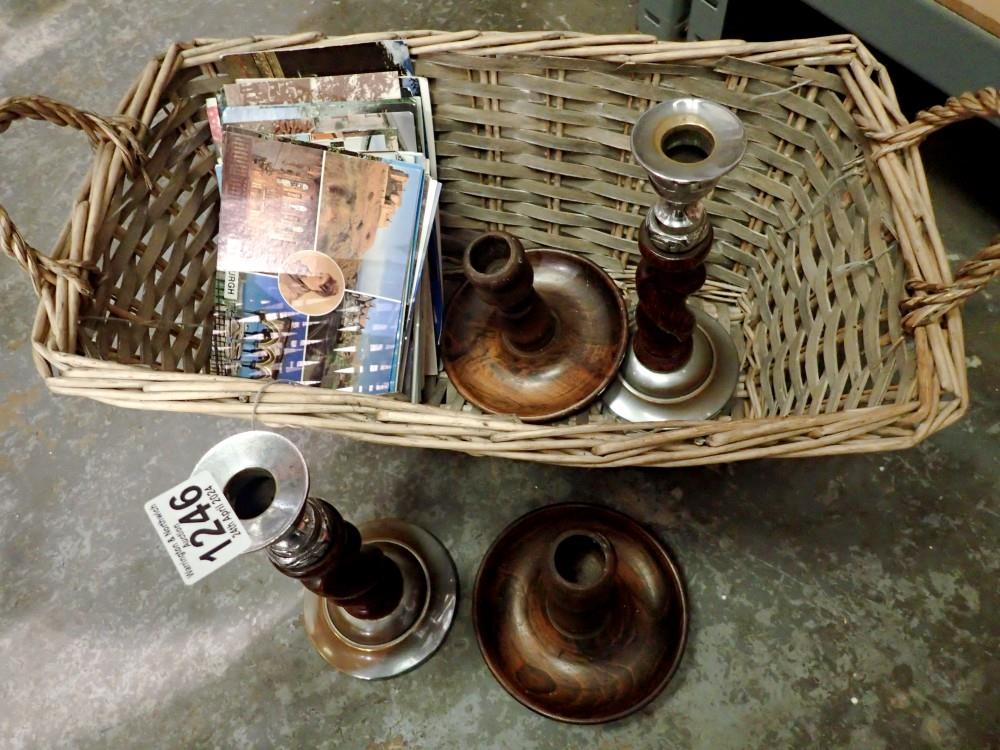 Basket of mixed items to include postcards and wooden candlesticks. Not available for in-house P&P