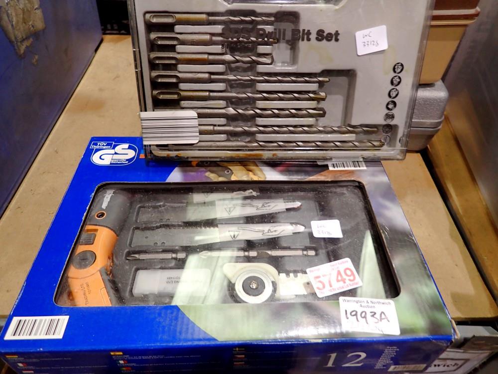 Boxed powerful cutting set and a drill set. Not available for in-house P&P