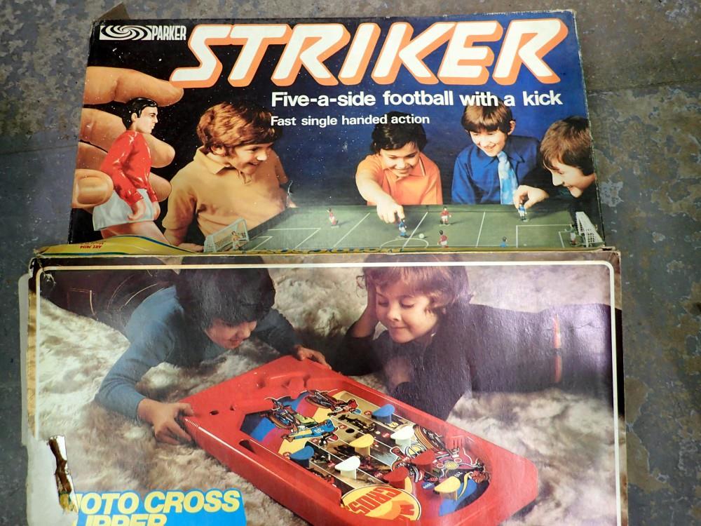 Striker & Moto cross flipper, two large board games. Not available for in-house P&P