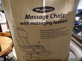 Solartronic TS-808B massage chair with massage footrest, factory sealed. Not available for in-