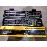 Two cased sets of drill and chisel bits. Not available for in-house P&P