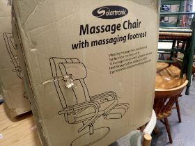 Solartronic TS-8-8B massage chair with massage footrest, factory sealed. Not available for in-