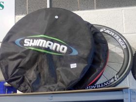 Two Shimano road wheels with bags along with a further two road wheels. Not available for in-house