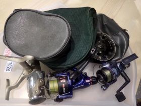 Three fixed spool reels and one centre pin reel and four reel cases. UK P&P Group 3 (£30+VAT for the