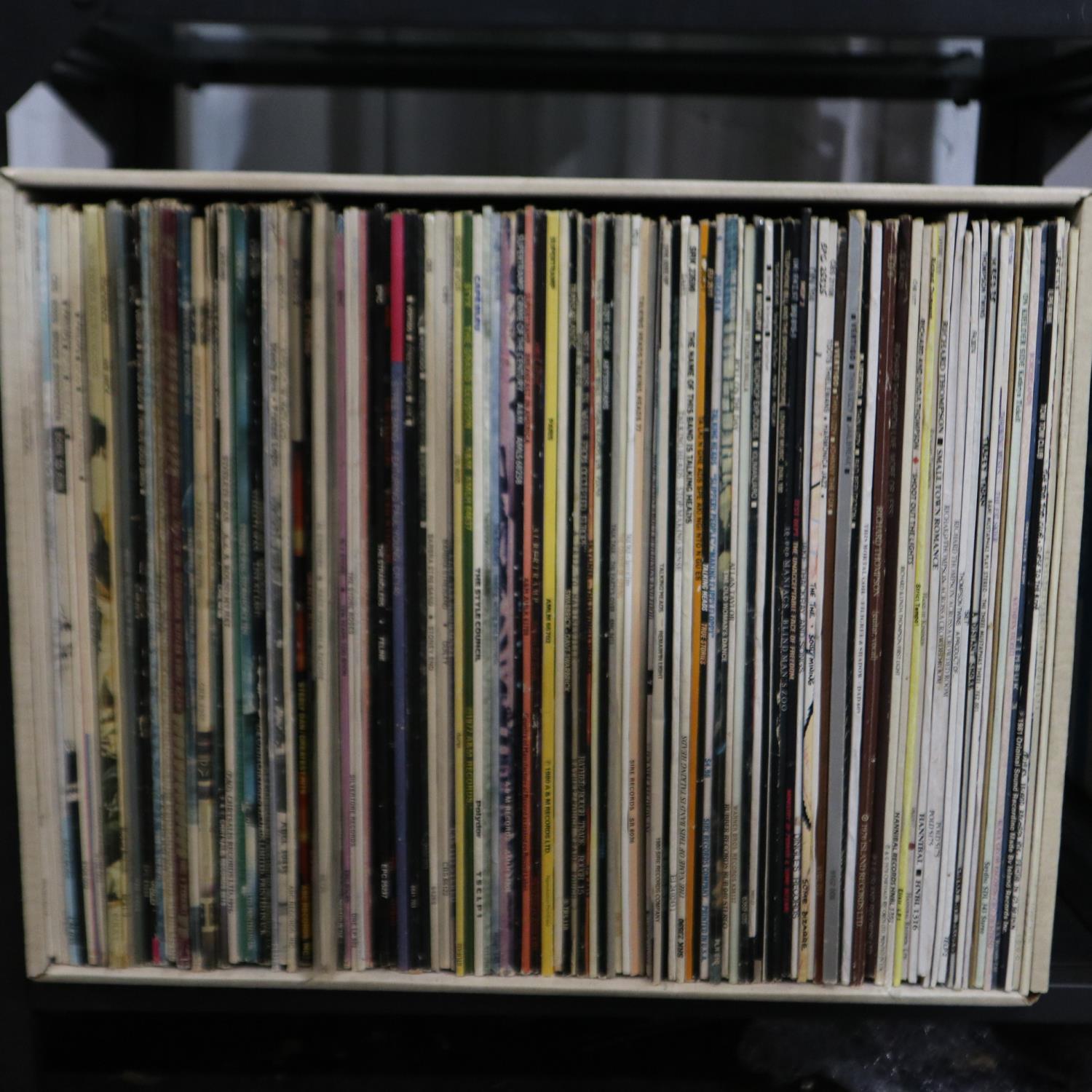 Approximately one hundred mixed rock and pop LPs. Not available for in-house P&P