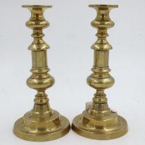 Pair of early brass candlesticks with pushers, H: 26 cm. UK P&P Group 2 (£20+VAT for the first lot