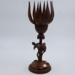 Far Eastern carved wooden lamp with opening bud, H: 45 cm. Not available for in-house P&P