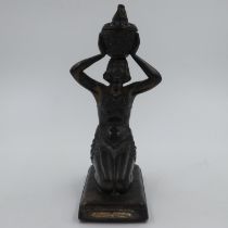 Spelter kneeling deity with plaque for the 1931 Paris Exposition Colonials, H: 29 cm. UK P&P Group 2
