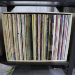 Approximately one hundred mixed rock and pop LPs. Not available for in-house P&P