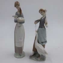 Lladro figure of a girl feeding a goose and another figure of a girl with a lamb, no chips or