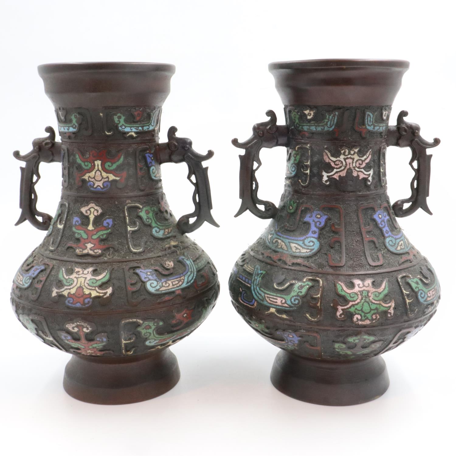 Two bronze enamelled vases, H: 31 cm. Not available for in-house P&P