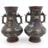 Two bronze enamelled vases, H: 31 cm. Not available for in-house P&P