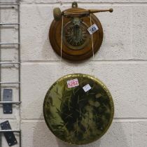 Brass gong on oak mounts on strung hanger with hammer. D: 25 cm. UK P&P Group 2 (£20+VAT for the
