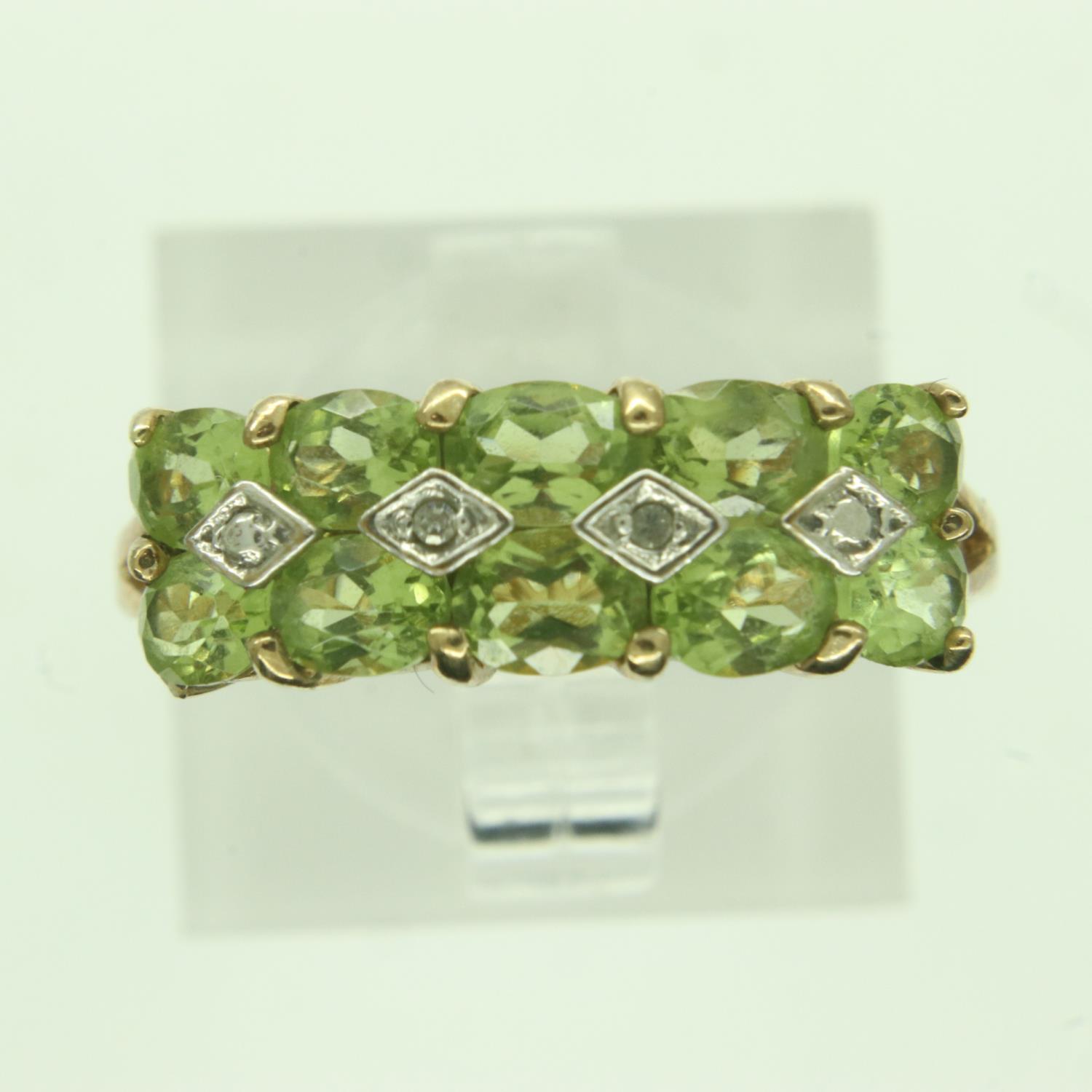 9ct gold diamond and peridot set ring, size P, 2.4g. UK P&P Group 0 (£6+VAT for the first lot and £