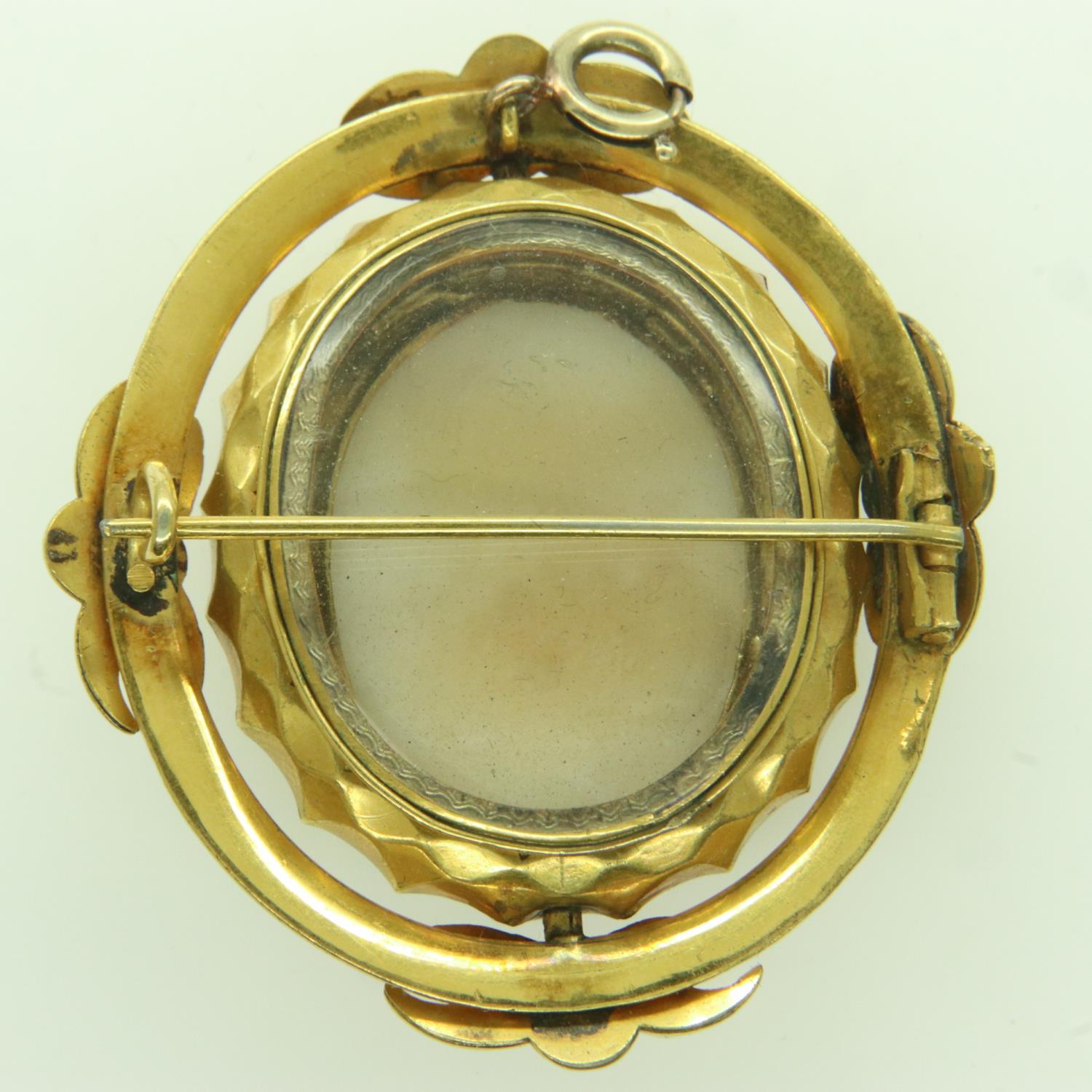A Victorian mourning brooch pendant, in an unmarked yellow metal frame, carved cameo front with - Image 2 of 2