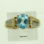 9ct gold ring set with blue topaz and diamonds, size O, 3.5g. UK P&P Group 0 (£6+VAT for the first