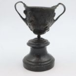 Grand tour bronze figural twin handled cup on marble socle base H: 22 cm. UK P&P Group 2 (£20+VAT