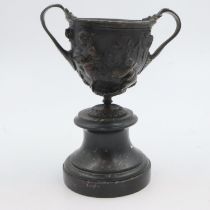 Grand tour bronze figural twin handled cup on marble socle base H: 22 cm. UK P&P Group 2 (£20+VAT