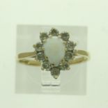 9ct gold cluster ring set with opal and cubic zirconia, size K, 1.6g. UK P&P Group 0 (£6+VAT for the