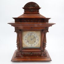 Large Junghans oak cased mantel clock, with brass dial and silvered chapter ring, chiming on a gong,
