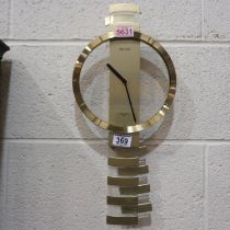 1980's Seiko watchstrap style pendulum wall clock, QPH108G, H: 48 cm, working at lotting up. UK P&