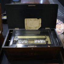 ***WITHDRAWN***Swiss music box playing ten tunes in an inlaid walnut case, L: 61 cm. Not available