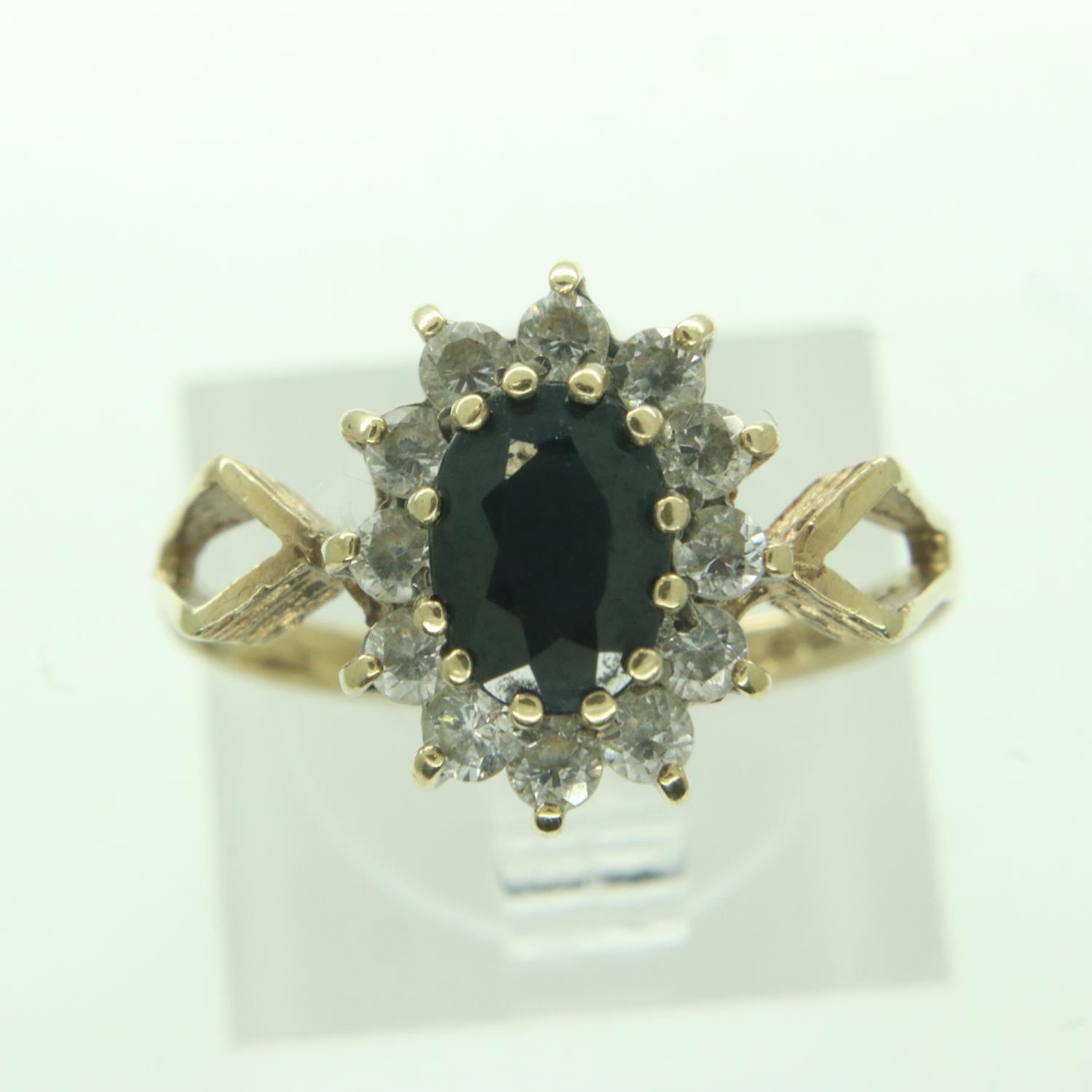 9ct gold cluster ring set with sapphire and cubic zirconia, size Q, 2.2g. UK P&P Group 0 (£6+VAT for