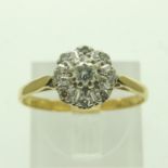 18ct gold diamond set cluster ring, size Q, 2.8g. UK P&P Group 0 (£6+VAT for the first lot and £1+