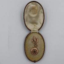 14ct gold fob watch and hanger for the St Louis World Fair 1904 in a fitted case. UK P&P Group 1 (£