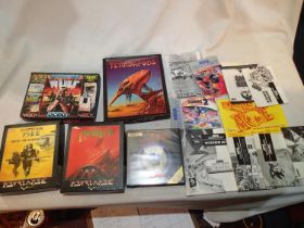 Five games, Captain Fizz, Menace, Terrorpods, Wolf, and Sentinel, plus a selection of game booklets.
