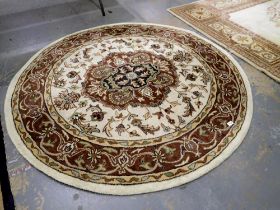 Circle cream floor rug. Not available for in-house P&P