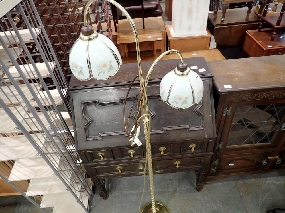 Brass room lamp on metal stand with glass shades, H: 158 cm. All electrical items in this lot have