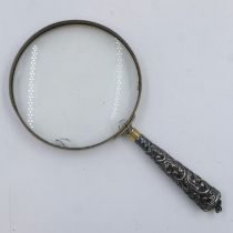 Vintage silver handled magnifying glass, D: 10 cm. UK P&P Group 2 (£20+VAT for the first lot and £