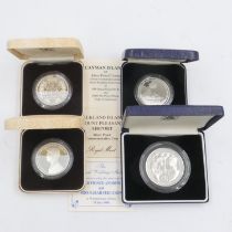 Four silver proof commemorative coins, each boxed. UK P&P Group 1 (£16+VAT for the first lot and £
