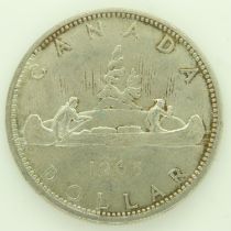 1965 Canadian silver dollar - nEF grade. UK P&P Group 0 (£6+VAT for the first lot and £1+VAT for