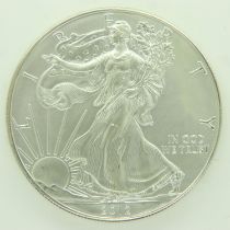 2012 American silver Liberty dollar - nUNC with irregular toning. UK P&P Group 0 (£6+VAT for the