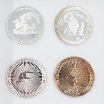 Four world silver bullion rounds to include Athenian owl type. UK P&P Group 1 (£16+VAT for the first