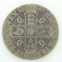1667 silver crown of Charles II. P&P Group 0 (£6+VAT for the first lot and £1+VAT for subsequent