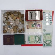 Victorian and later coins including silver examples, banknotes and a Lloyds Bank money box. UK P&P