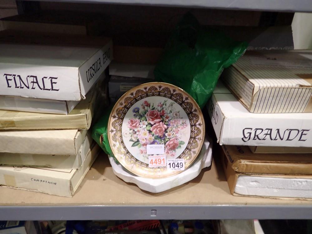 Shelf of mixed plates including Wedgwood. Not available for in-house P&P