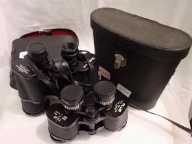 Two pairs of binoculars, Boots 10 X 50 and another. UK P&P Group 2 (£20+VAT for the first lot and £